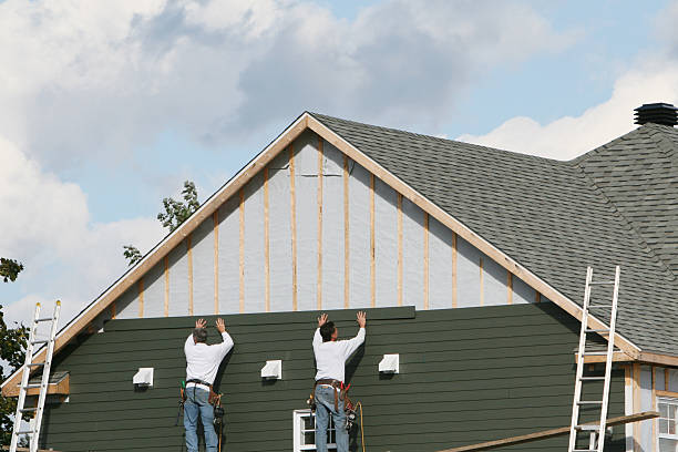 Professional Siding technician working in Islip, NY